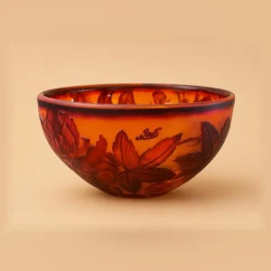 Glass bowl with raised leaf carving